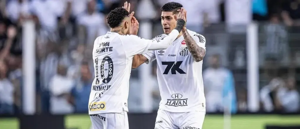 Neymar e Adonis Frías em ação (Foto: Raul Baretta-Santos FC)